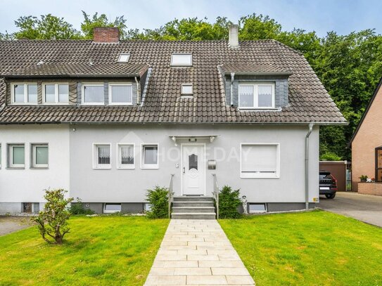 Attraktive Doppelhaushälfte mit 2 WEs, Garten und Terrasse in begehrter Lage