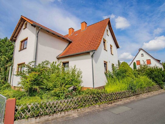 Familienfreundliches Einfamilienhaus mit großem Garten und Garage