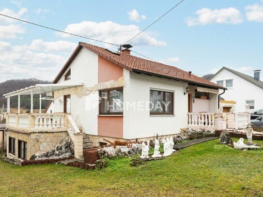 Gemütliches Einfamilienhaus mit schönem Garten und Potential in ruhiger Ortsrandlage