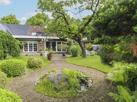 Gepflegte Doppelhaushälfte auf schönem Eigenlandgrundstück mit großem Garten, Terrasse und Garage