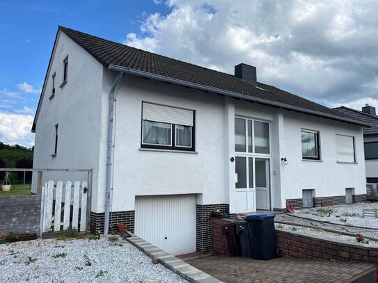 Zweifamilienhaus mit 2 Garagen in Leimbach