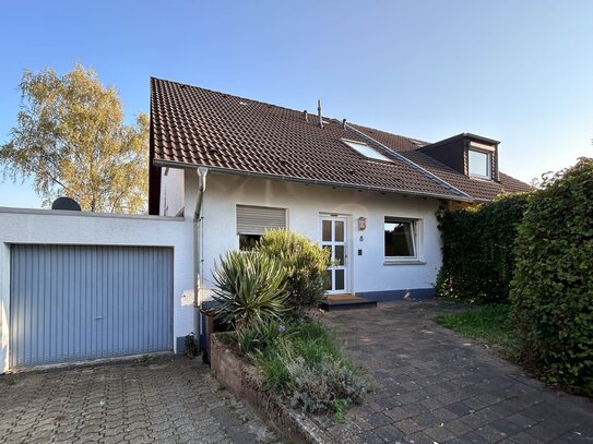 Charmantes Eigenheim mit Garten und Garage in ruhiger Lage - Ideal für Familien!