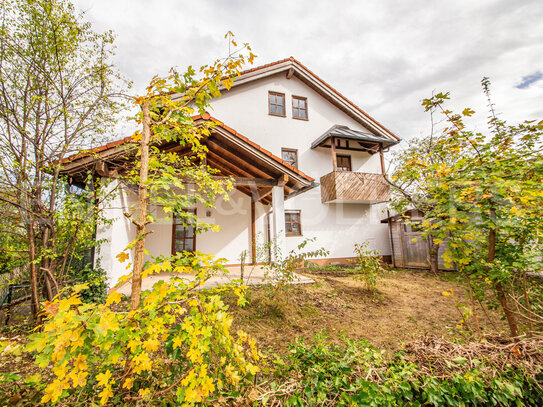 ENGEL & VÖLKERS - Außergewöhnliche Maisonette-Wohnung mit Hauscharakter und Garten