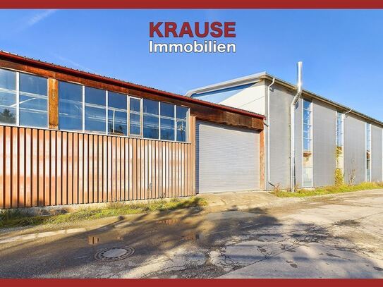 *Geschäftsgebäude mit Ausstellungsräumen, Lager, Büro, Wohnung und großer Halle*