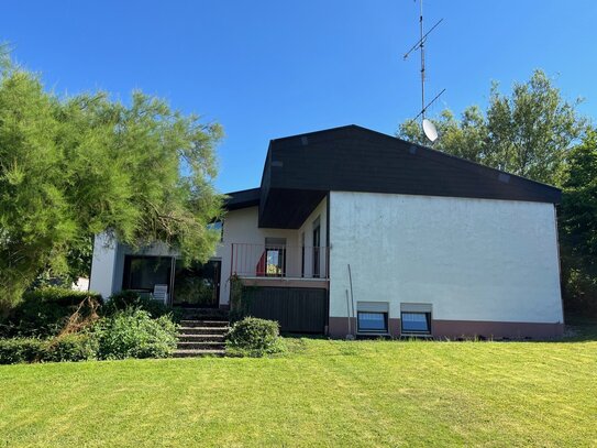 Auf Wollbachs Sonnenterrasse: Architektenhaus in Egisholz mit ELW und großem Garten