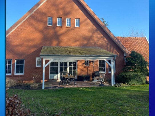 Lichtdurchflutete ebenerdige 3-Zimmer-Erdgeschosswohnung mit Garten und Garage in ruhiger Lage