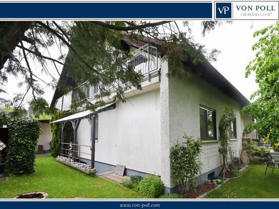 Geräumiges Familienhaus in grüner Umgebung mit Garten und Garage