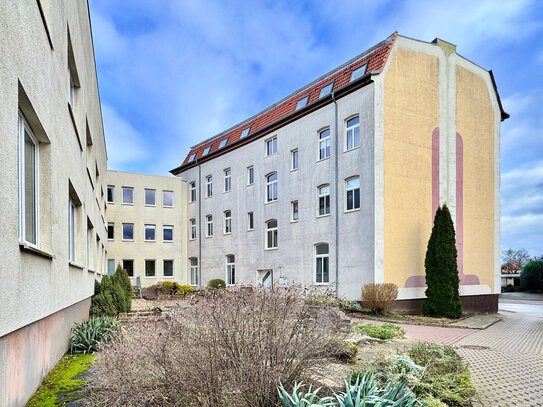 MEHRFAMILIENHAUS UND GEWERBEEINHEITEN IN OSCHERSLEBEN (BODE)