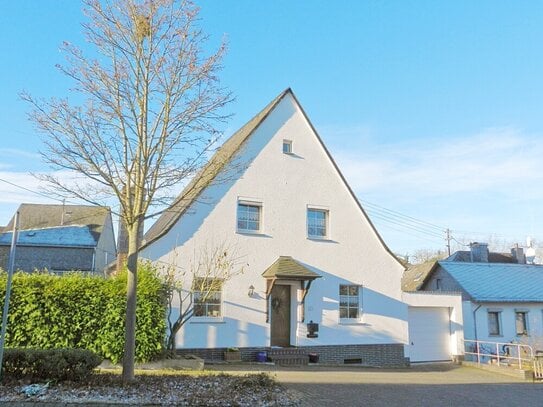 Longkamp: Gepflegtes, freistehendes Einfamilienhaus mit Garage und Terrasse!