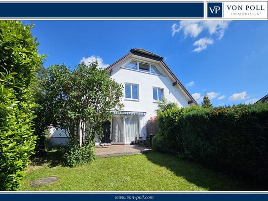 A-Lage mit Fernblick: Top gepflegtes 2-Familien-Haus mit schönem Garten, 2 Garagen + 2 Stellpl.