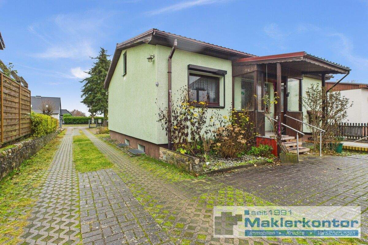 Immobilie in Neustrelitz - Gepflegtes Einfamilienhaus mit Souterrain und Einliegerwohnung in begehrter Lage - Bild 0