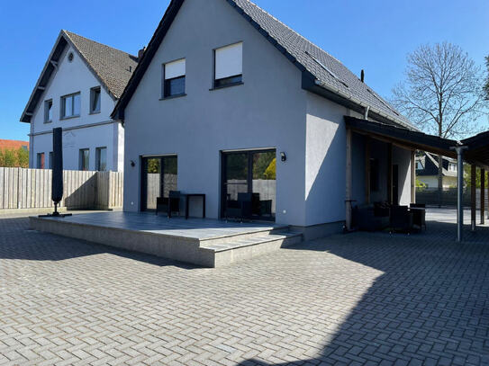 Modernes Einfamilienhaus mit Carport in Butjadingen-Tossens zur Miete