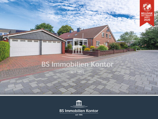 Uttum! Renovierte, gepflegte Doppelhaushälfte mit Garage, Gartenanlage und Wintergarten!