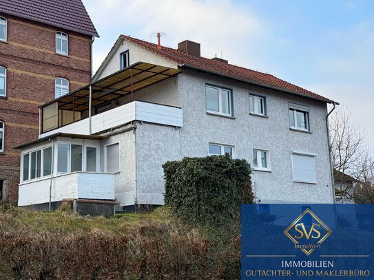 Moderne Erdgeschosswohnung mit Wintergarten, Balkon und Garage in zentraler Lage von Melsungen.