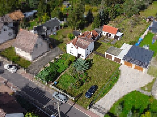 Einfamilienhaus mit Doppelgarage und großem Grundstück in Klitzschen