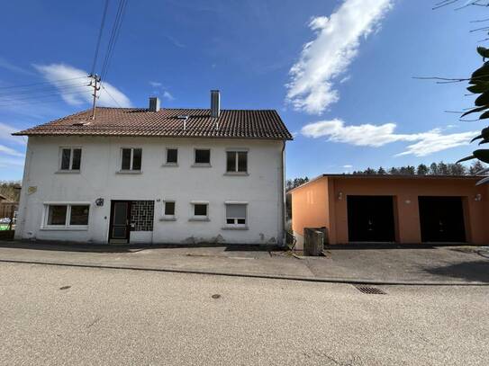 Platz für Ihre Vision: Sanierungsbedürftiges Wohnhaus und Baugrundstück