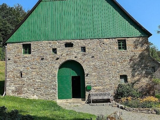 Generalsanierte Wohnung in historischem Reidemeisterhaus, mitten in der Natur.