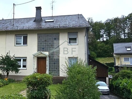 Mehrfamilienhaus (Doppelhaushälfte) in Siegen- Trupbach