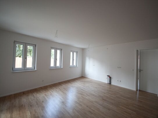 Neubau-Erstbezug! Schöne 4-Zimmer-Wohnung mit Terrasse und Gartenanteil!