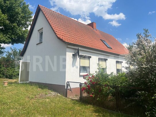 Grundstück mit Einfamilienhaus in Wassernähe