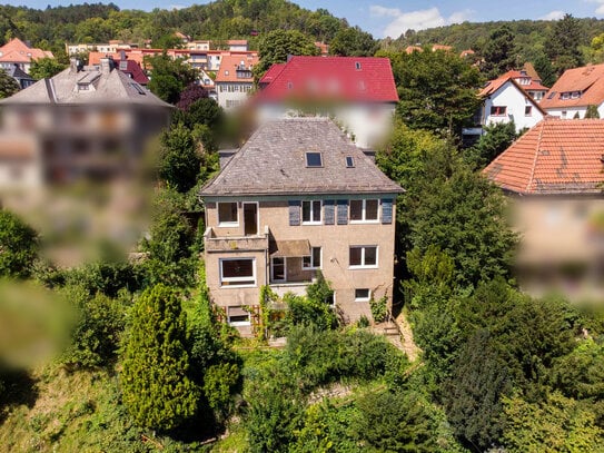 Sanierungsbedürftiges Mehrfamilienhaus in bester Lage