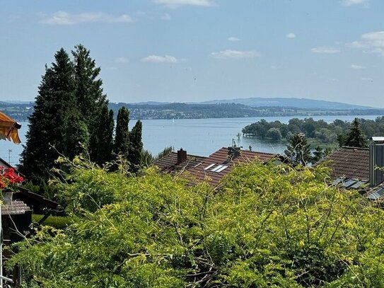 Charmantes Mittelhaus mit Seeblick und vielseitigen Rückzugsorten