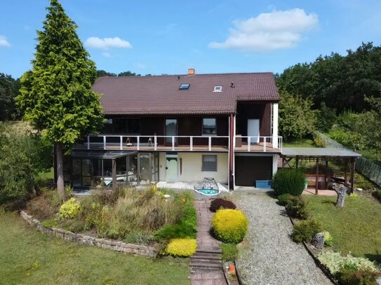 Einfamilienhaus mit Potenzial auf großem Grundstück in Waldrandlage