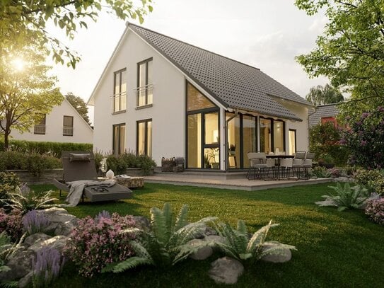 Natur genießen: Modernes Haus mit Wintergarten und Blick ins Grüne