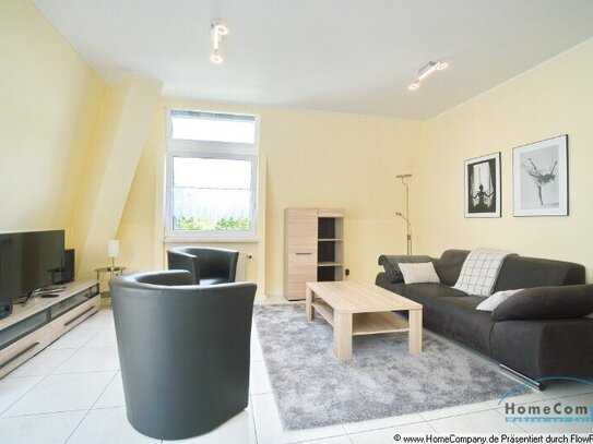 Apartment split over two levels, with balcony and parking space, in quiet, sought-after residential area.