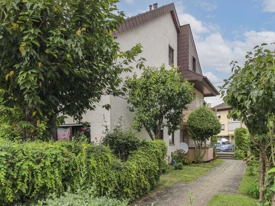 Citynahe 2-Zimmer-Wohnung mit TG-Stellplatz und grüner Terrasse