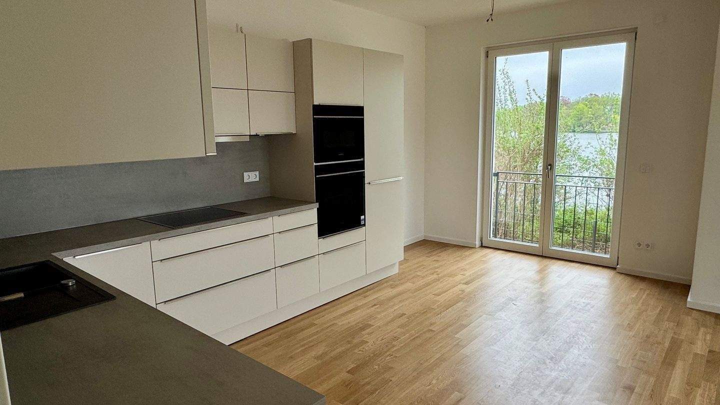 Erstbezug 4-Zi-Neubauwohnung direkt am Wasser - Foto 1