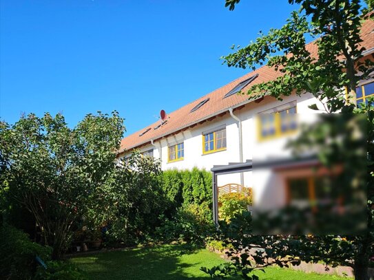 Hübsches Reihenmittelhaus mit Carport als Kapitalanlage