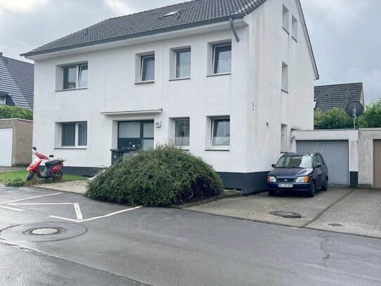 Gut vermietetes Dreifamilienhaus in bester Lage von Langenfeld.