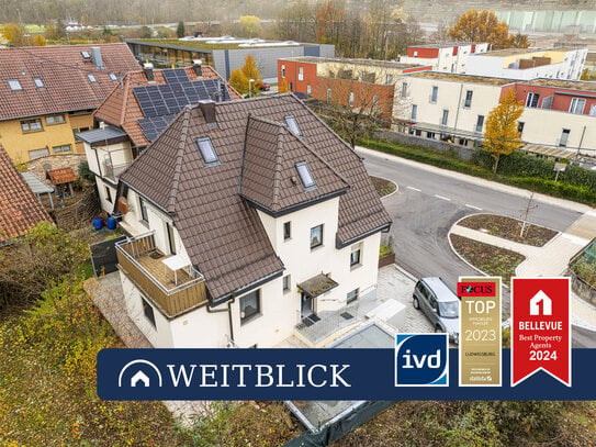 WEITBLICK: Vielseitiges 2-Familienhaus mit Einliegerbereich, Garage und großem Garten!