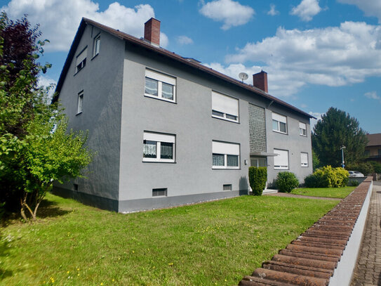 Modernes Mehrfamilienhaus mit großem Garten und Garagen in ruhiger Lage von Elsenfeld