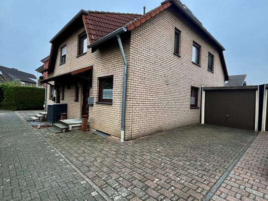 Im Niersenbruch Familienfreundliche Doppelhaushälfte mit Garten und Garage - Ihr neues Zuhause in Kamp-Lintfort