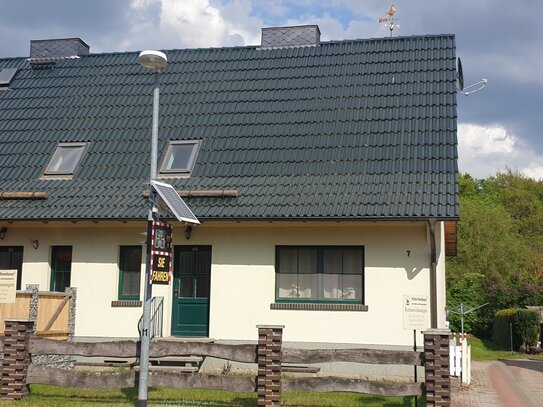 Doppelhaushälfte mit zwei lukrativen Ferienwohnungen oder zur Selbstnutzung im Müritz-Nationalpark