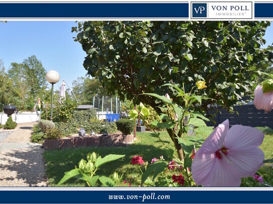 2 für 1: Erdgeschosswohnung und vermietetes Souterrain - Garage, Stellplatz, Garten