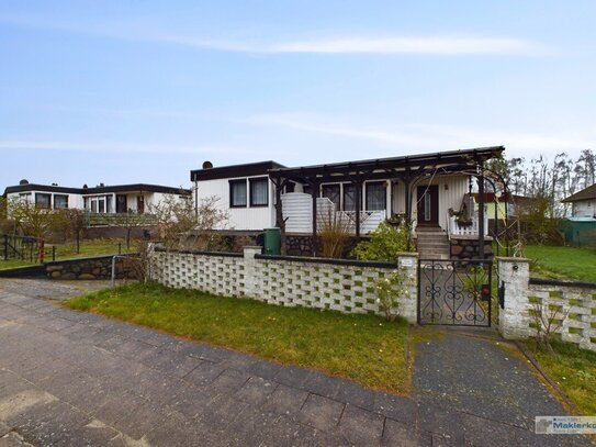 gemütlich unterkellerter Bungalowstil mit Garage