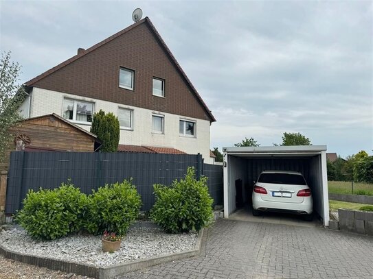 *Doppelhaushälfte mit Garage und Garten in Förste*