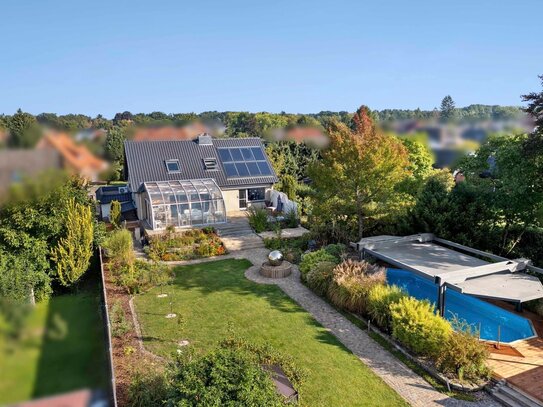 Edles Wohnjuwel mit exklusiver Ausstattung inkl. Pool, Sauna, PV-/Solaranlage, Wintergarten uvm.