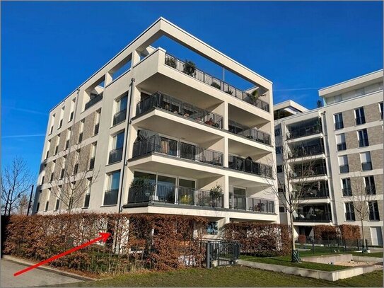 Helle Wohnung am Wasser mit großem Garten, zwei Terrassen & Tiefgaragenstellplatz