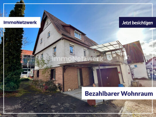 Mittendrin im Stadtteil Unterjesingen: Lebendiges Wohnhaus mit 2 Garagen und Gewölbekeller