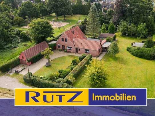 Delmenhorst | Idyllisches Einfamilienhaus mit Einliegerwohnung, Nebengebäuden und großem Garten