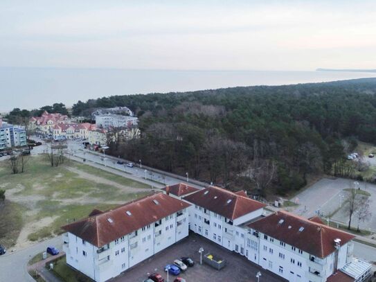 Tolles Raumgefühl in unmittelbarer Ostseenähe: Gepflegte Maisonette mit Südbalkon und Stellplatz