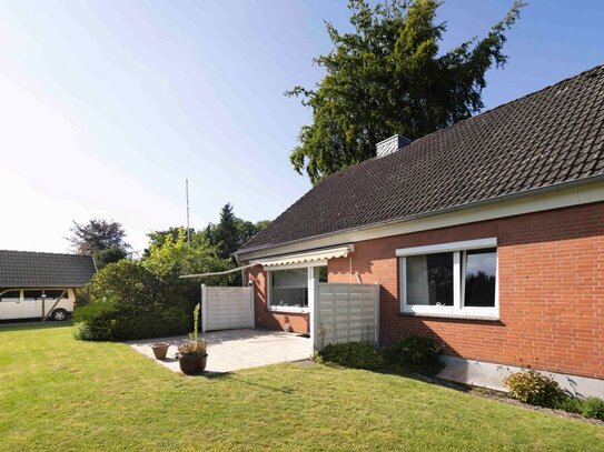 Charmantes Einfamilienhaus mit großzügigem Garten und Carport zur Vermietung