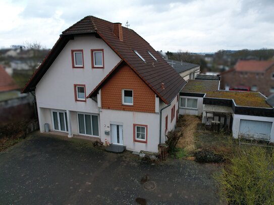 Einfamilienhaus mit Gewerbehalle und Garten auf 2.600 m² Grundstück in Borgentreich-Borgholz