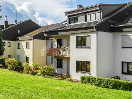 Charmante Erdgeschosswohnung mit großer Terrasse und Zugang zum grünen Außenbereich in ruhiger Lage