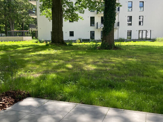 Erstbezug! 3 Zimmer mit Terrasse, Einbauküche und Stellplatz mit E-Ladefunktion