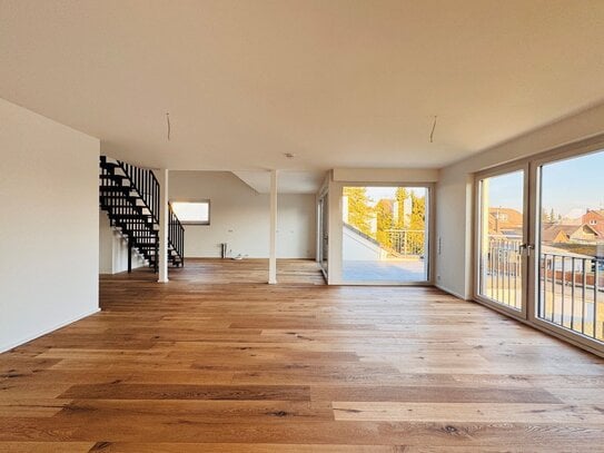 Faszinierende Maisonettewohnung mit geräumiger Loggia: